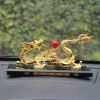 Tượng Rồng vàng như ý nhả ngọc phong thủy để taplo ô tô