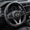 Bọc vô lăng Nissan chất liệu Da cừu thật sợi Carbon cao cấp
