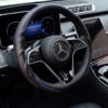 Bọc vô lăng xe Mercedes Da cừu thật vân Carbon cao cấp
